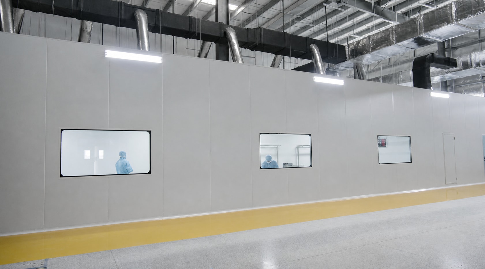 IDEAL cleanroom production area viewed from the factory corridor